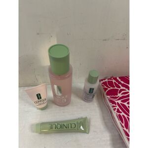 Clinque extremely cleaning lotion products with pink bag cosmetics open lot
